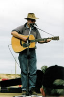 image of Bill Marsh with his guitar